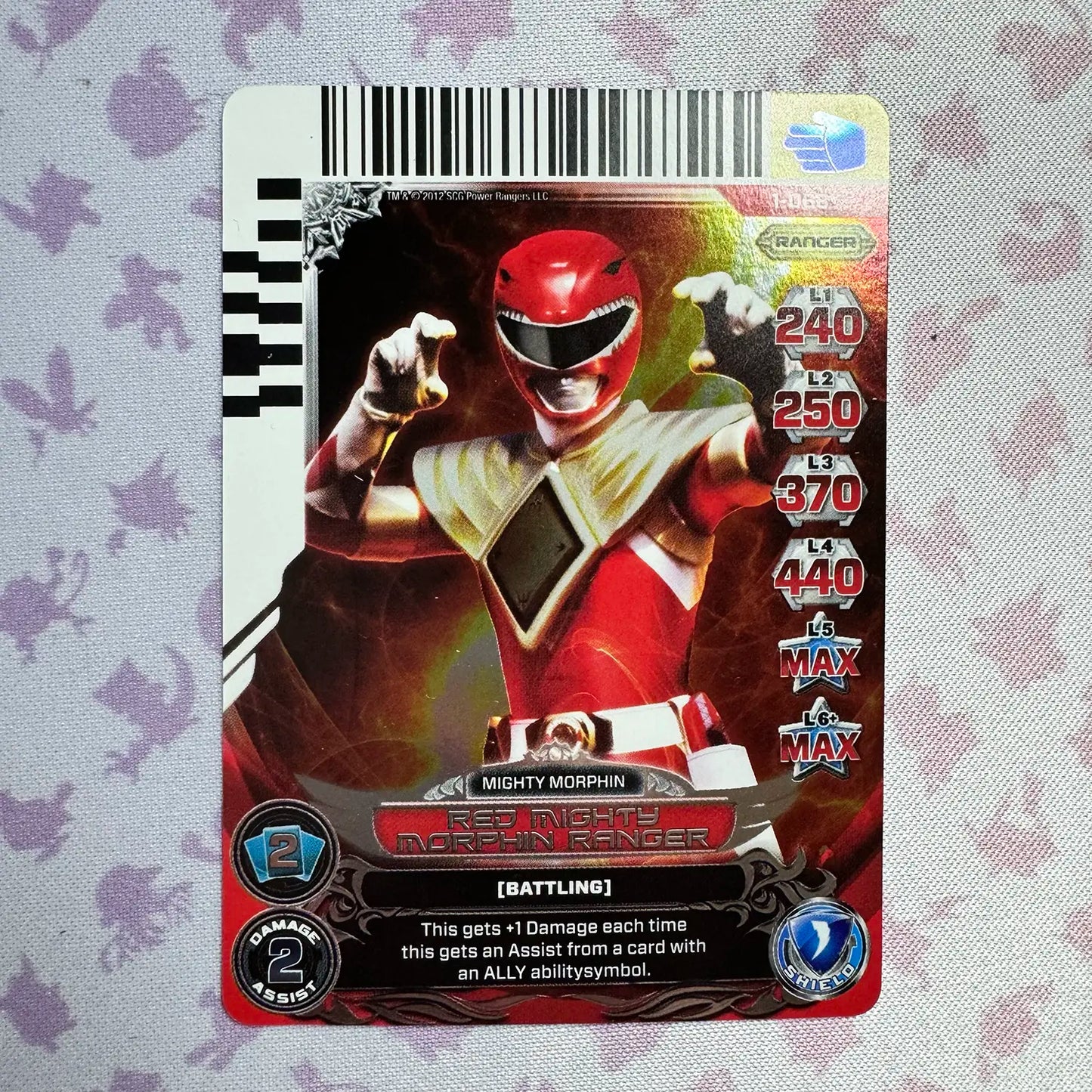 Super Rare card featuring the Red Ranger with the Dragon Shield from Mighty Morphin Power Rangers. Found in the Rise of Heroes set in the Power Rangers Action Card Game