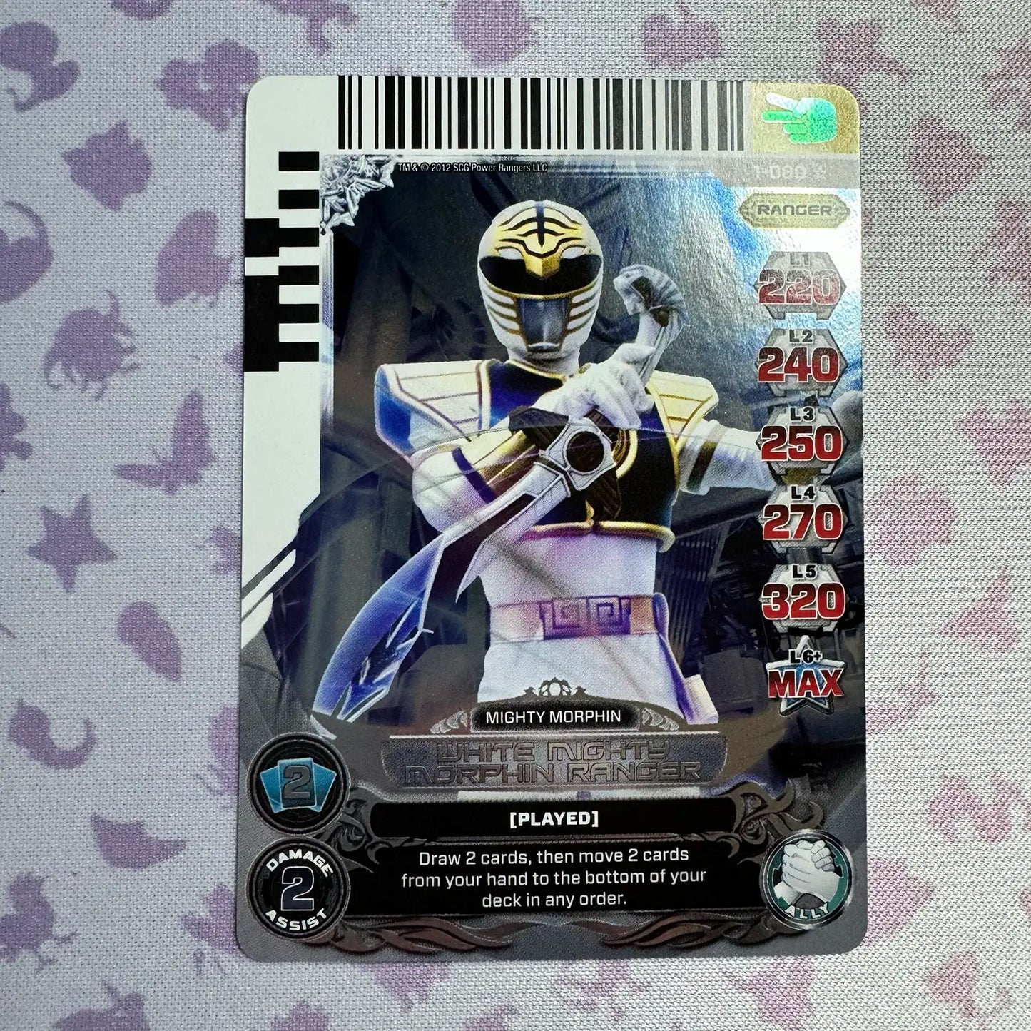 Super Rare card featuring the White Ranger from Mighty Morphin Power Rangers. Found in the Rise of Heroes set in the Power Rangers Action Card Game.
