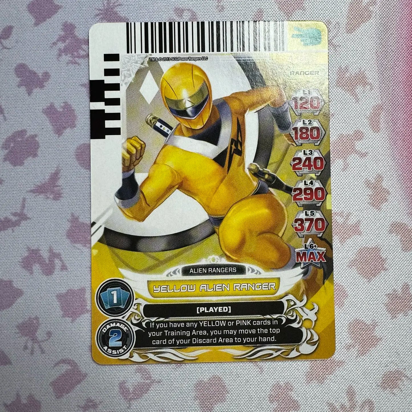 Common card featuring the Yellow Alien Ranger from Mighty Morphin Alien Rangers. Found in the Legends Unite expansion to the Power Rangers Action Card Game